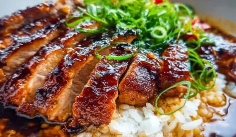 Caramelised Soy Chicken in Garlic Ginger Broth on jasmine rice with scallions
