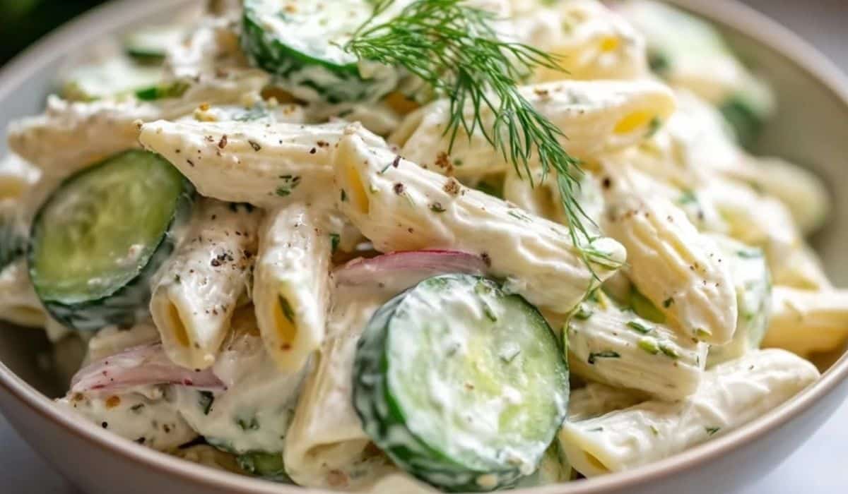 Creamy cucumber pasta salad with dill and penne served in a bowl