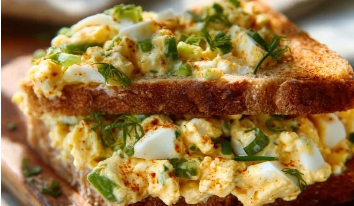Crispy Egg Salad sandwich with toasted bread and fresh herbs