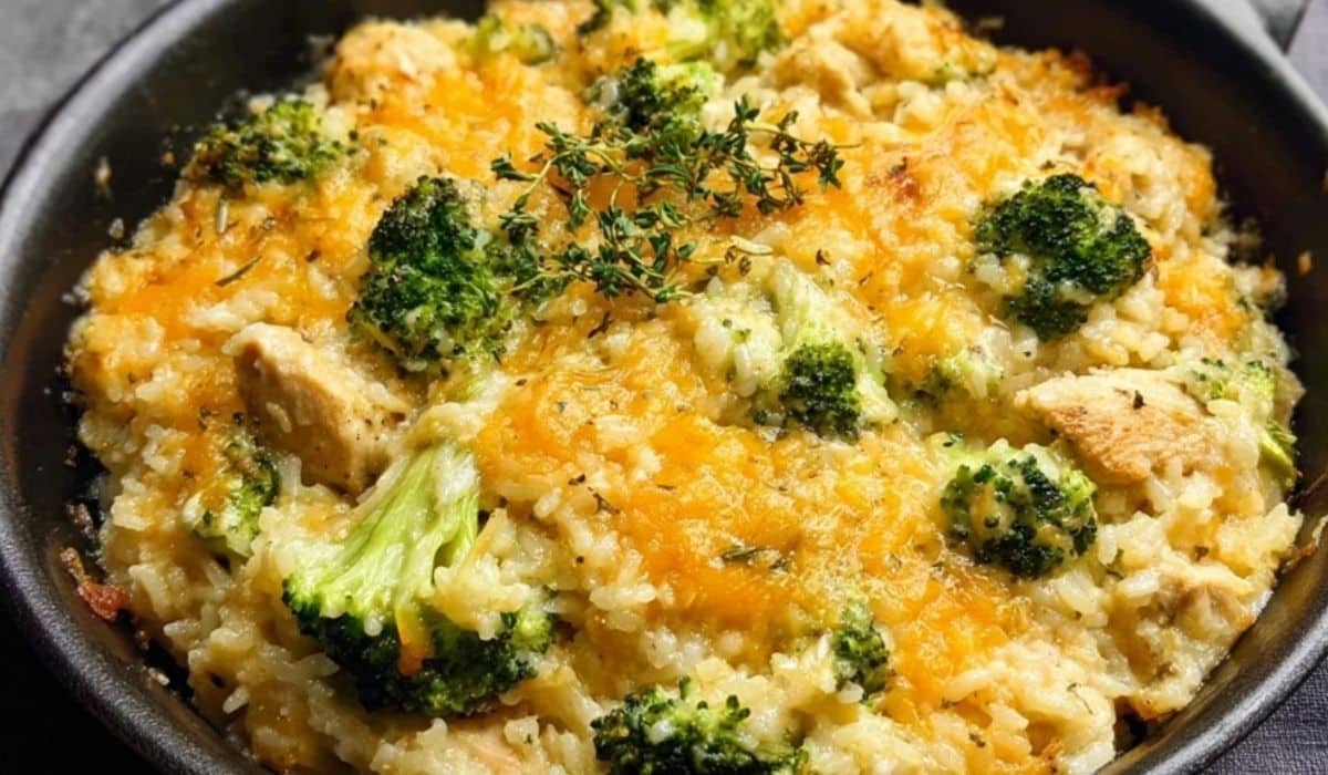 Cheesy Broccoli Chicken and Rice Casserole fresh out of the oven with melted cheddar and golden edges