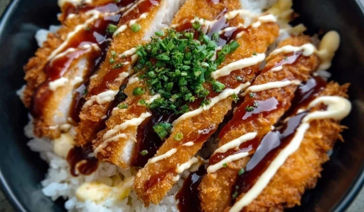 Featured Japanese Katsu Bowls with Tonkatsu Sauce topped with crispy pork cutlets, Tonkatsu sauce, and rice.