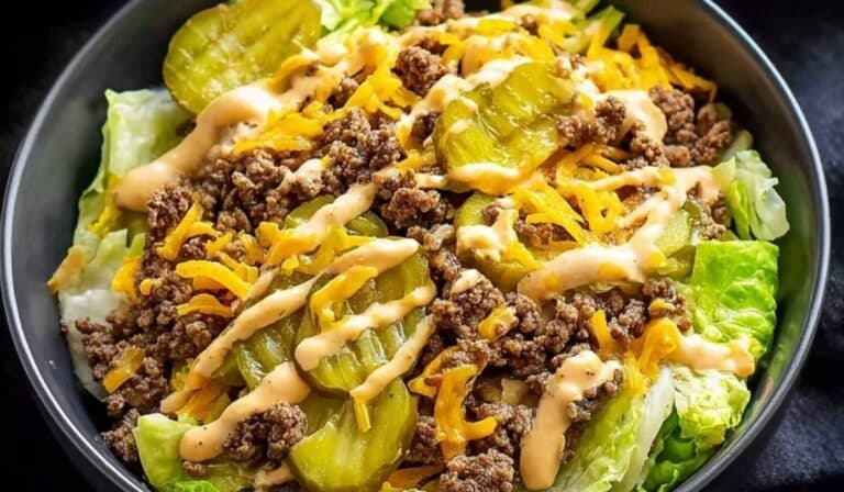 Keto Big Mac Salad with ground beef, cheddar cheese, pickles, and special sauce