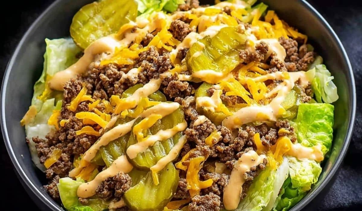 Keto Big Mac Salad with ground beef, cheddar cheese, pickles, and special sauce