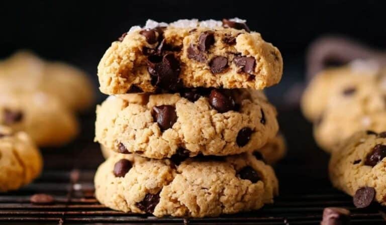 Vegan Chickpea Chocolate Chip Cookies stacked with a bite on top