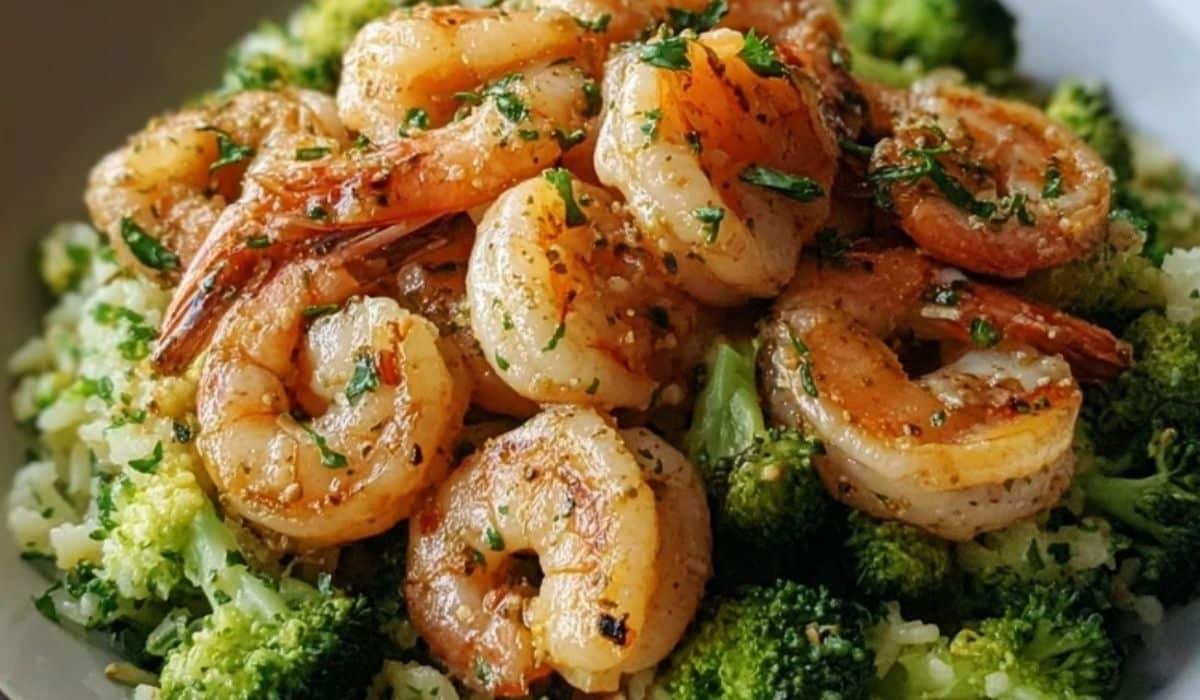 Garlic Butter Shrimp served over fluffy broccoli rice with herbs