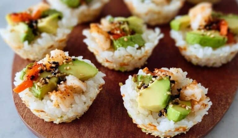 Sushi Cups filled with avocado, shrimp, and spicy mayo on a wooden board