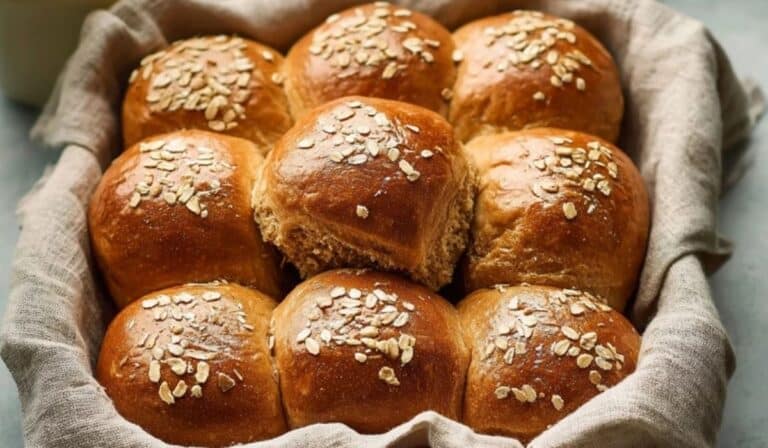 Oatmeal Molasses Dinner Rolls served in a rustic bread basket