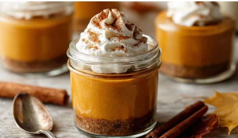 Pumpkin Pie in a Jar on a rustic fall table