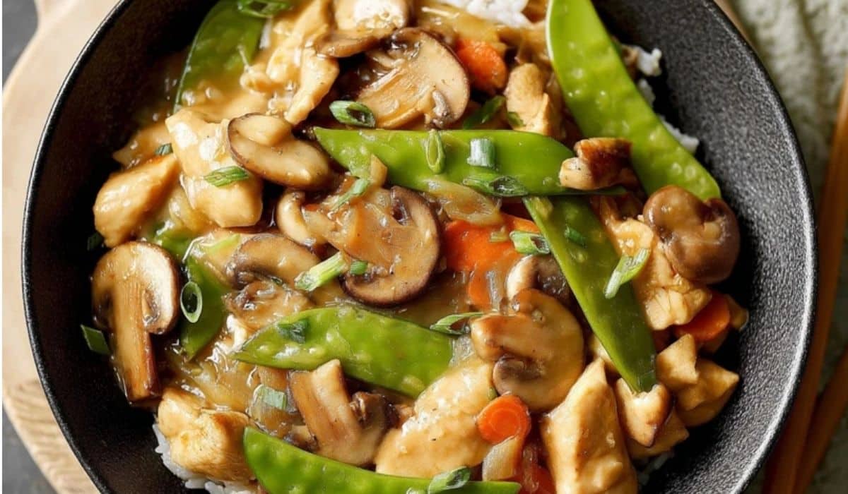 The Best Moo Goo Gai Pan served in a white bowl with rice